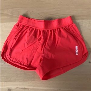 Red gym shark shorts